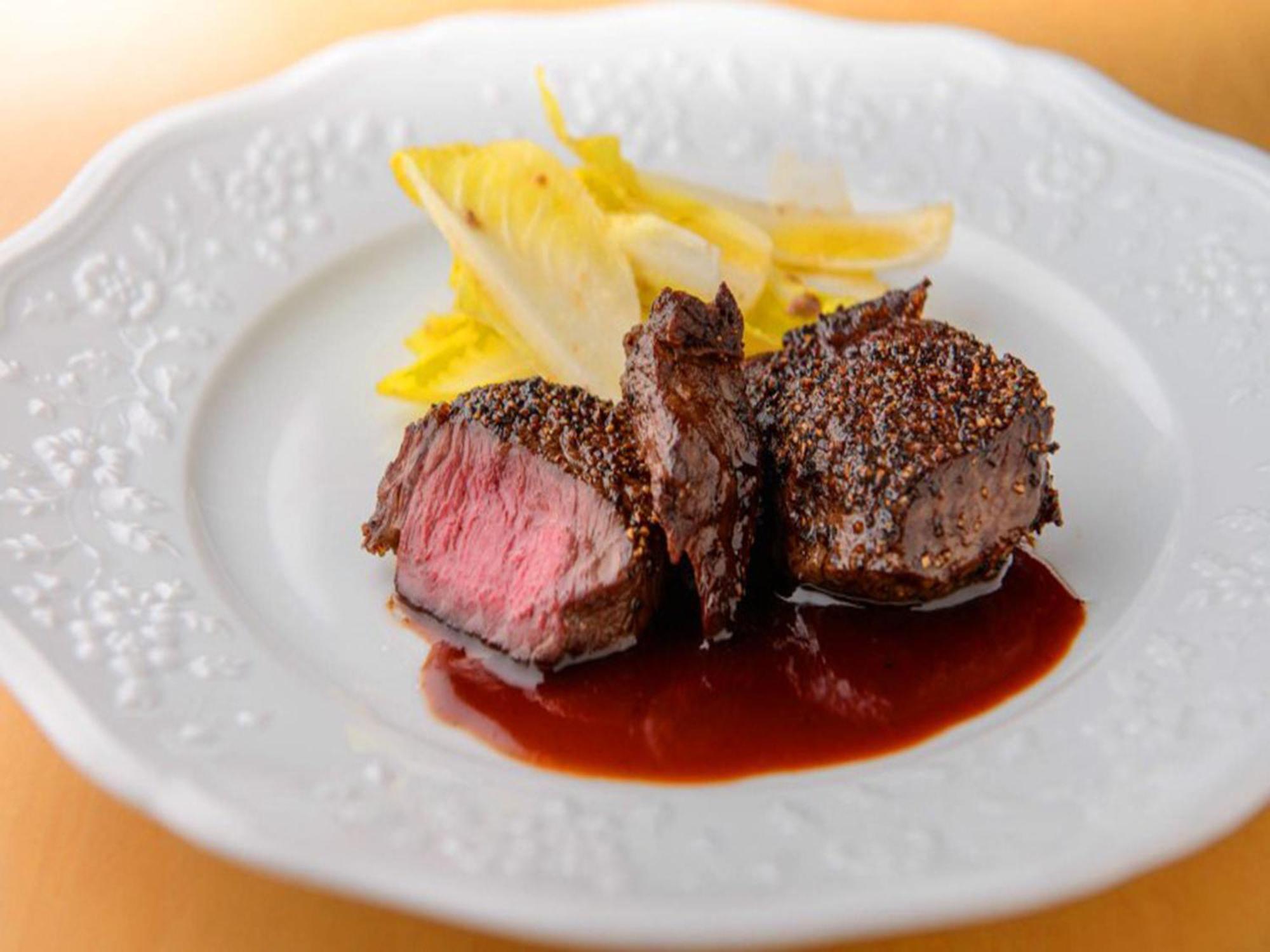 Shin Furano Prince Hotel Exterior photo A steak prepared using the dry-aging technique